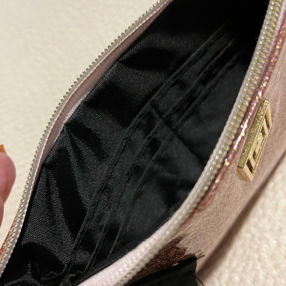 Liz Claiborne wristlet with power bank